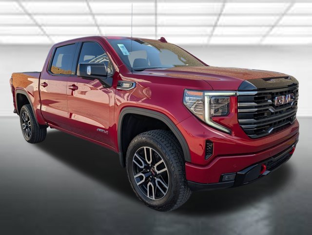 Used 2025 Volcanic Red Tintcoat GMC AT4 image 1