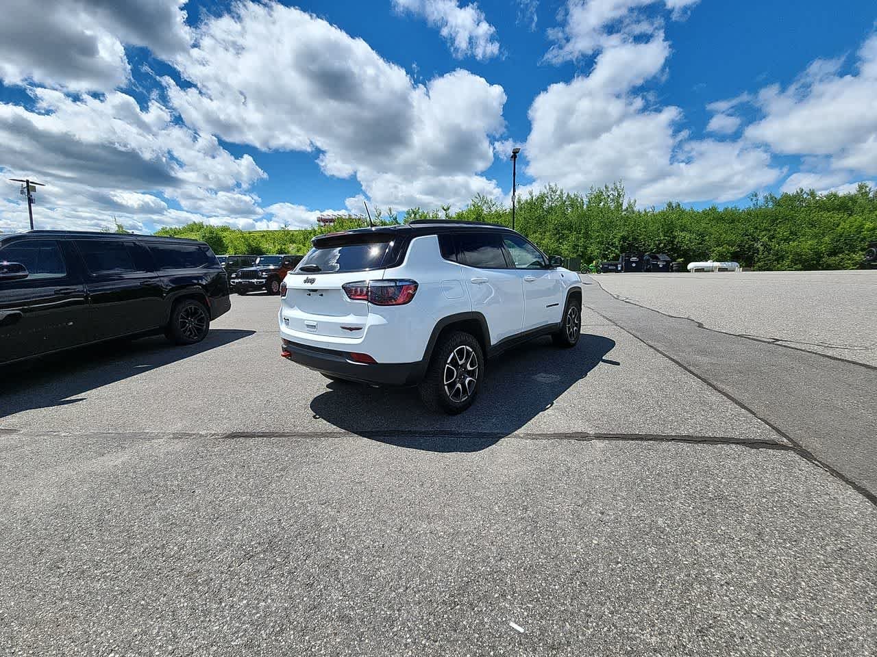 Used 2025 Bright White Clearcoat Jeep Trailhawk image 9