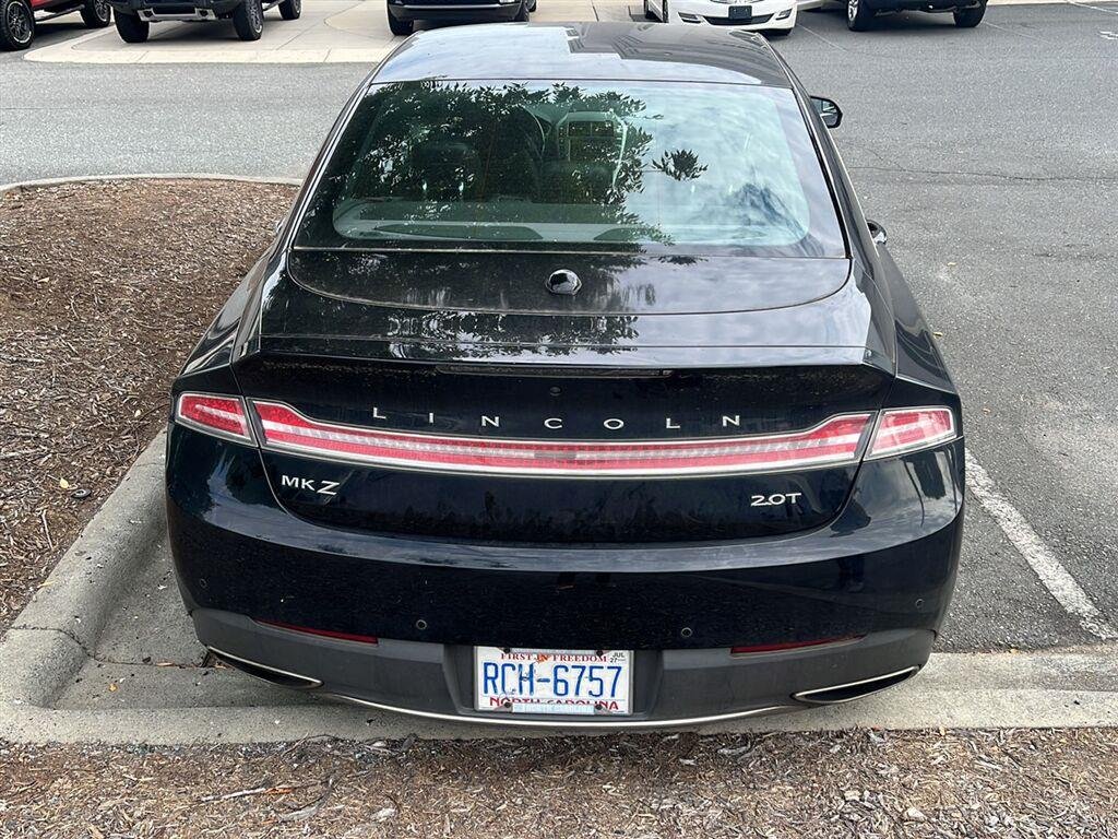 Used 2018 Black Velvet Lincoln Premiere image 4