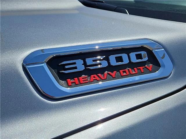 Used 2024 Billet Silver Metallic Clearcoat RAM Big Horn 4x4 Crew Cab 8 ft. box 169.5 in. WB image 4