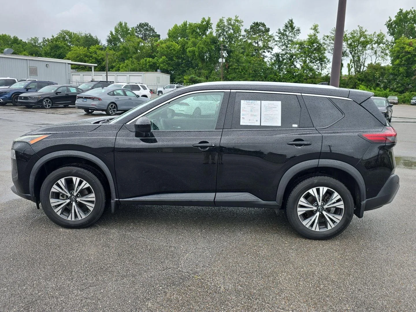 Used 2023 Super Black Nissan SV image 9