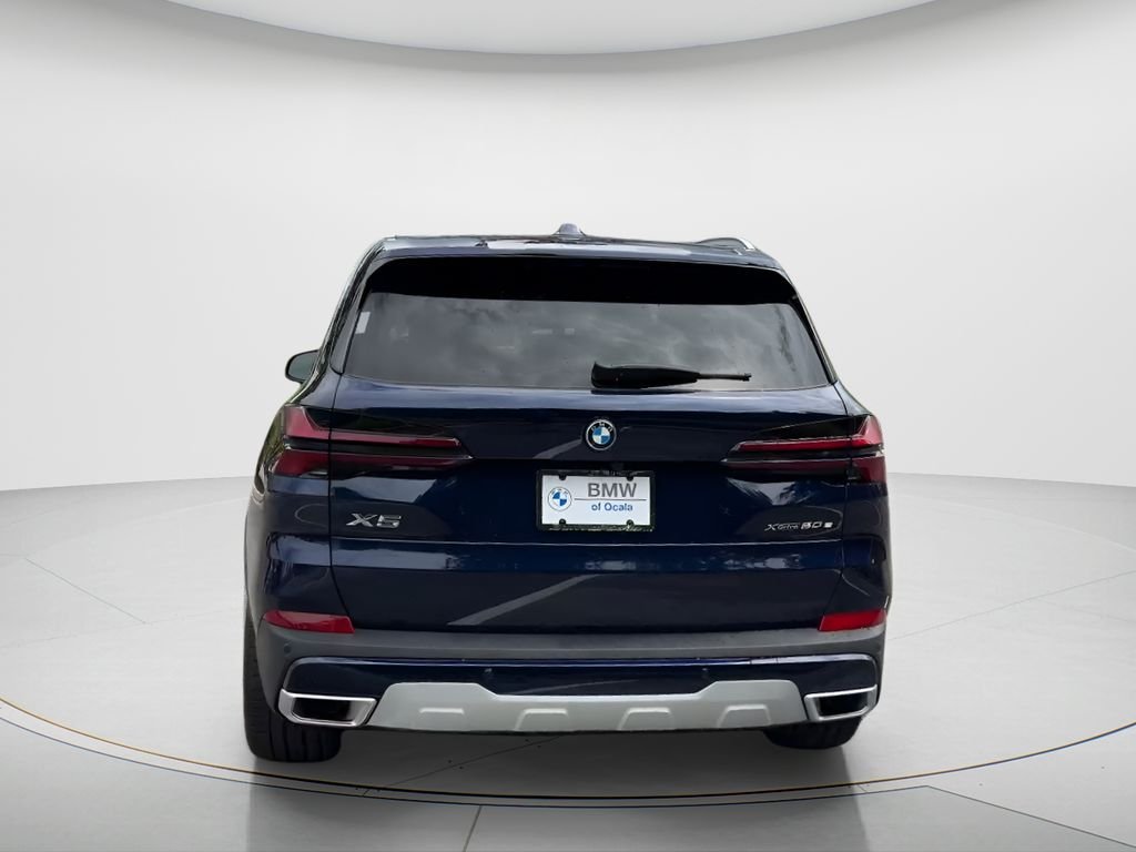 New 2026 Tanzanite Blue II Metallic BMW xDrive50e image 12