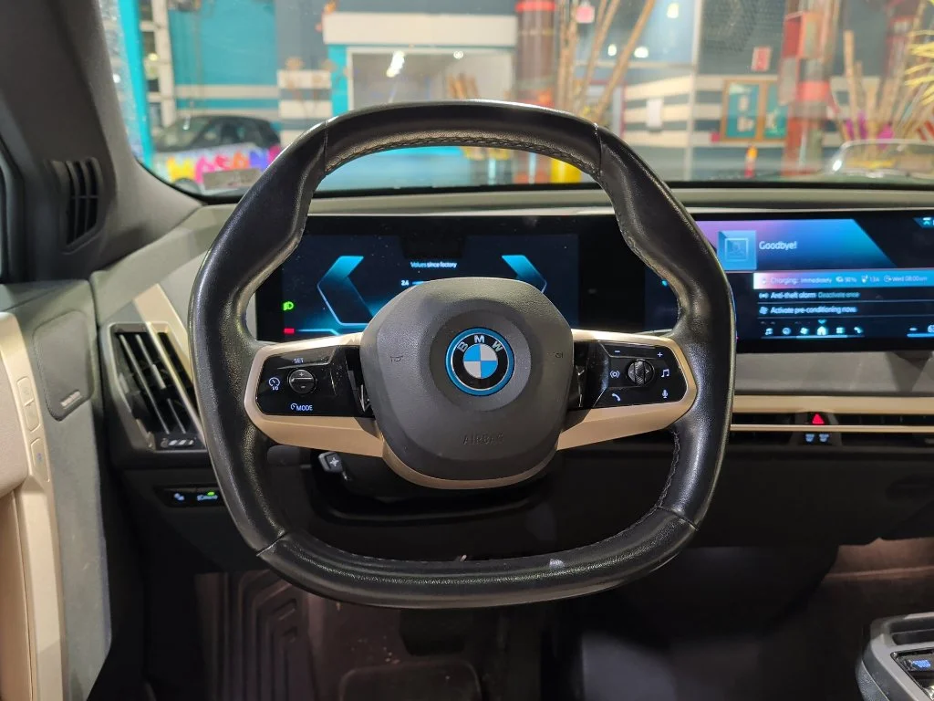 Used 2024 Blue BMW xDrive50 image 2