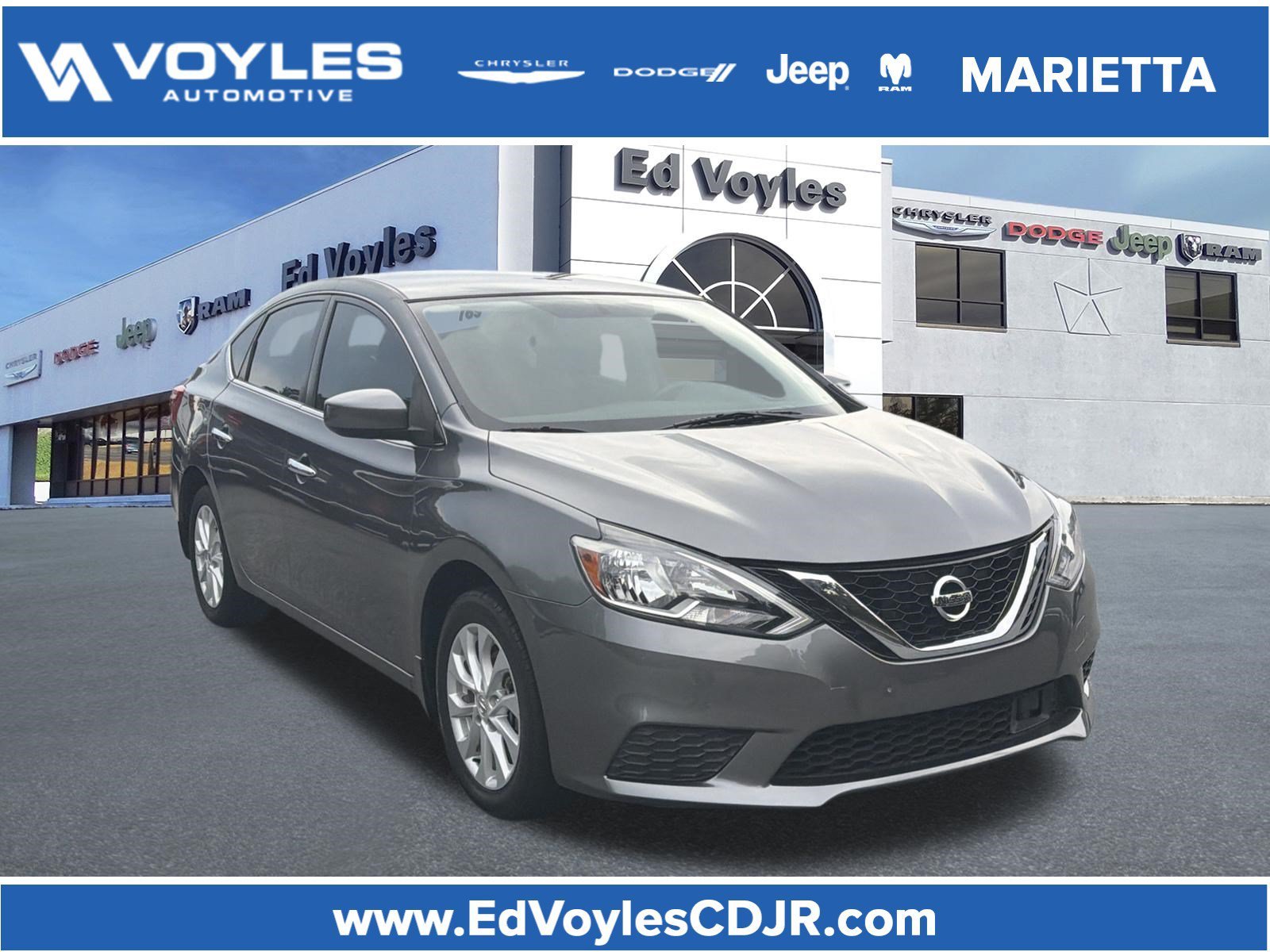 Used 2019 Gun Metallic Nissan SV image 1