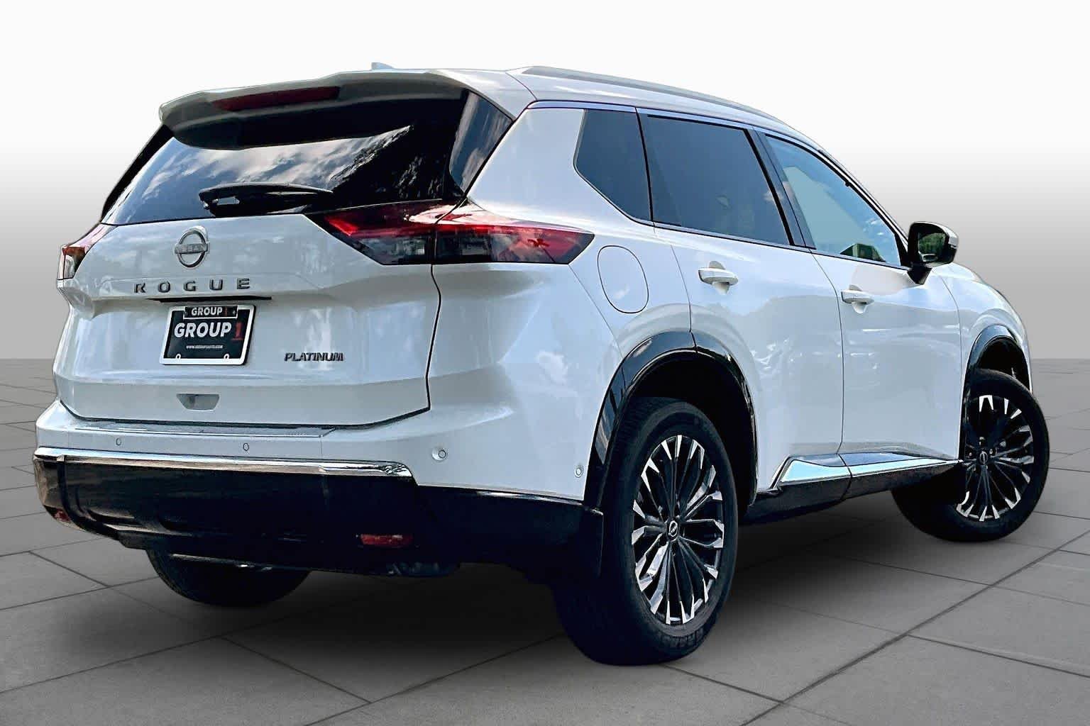 Used 2024 Everest White Pearl Nissan Platinum image 13