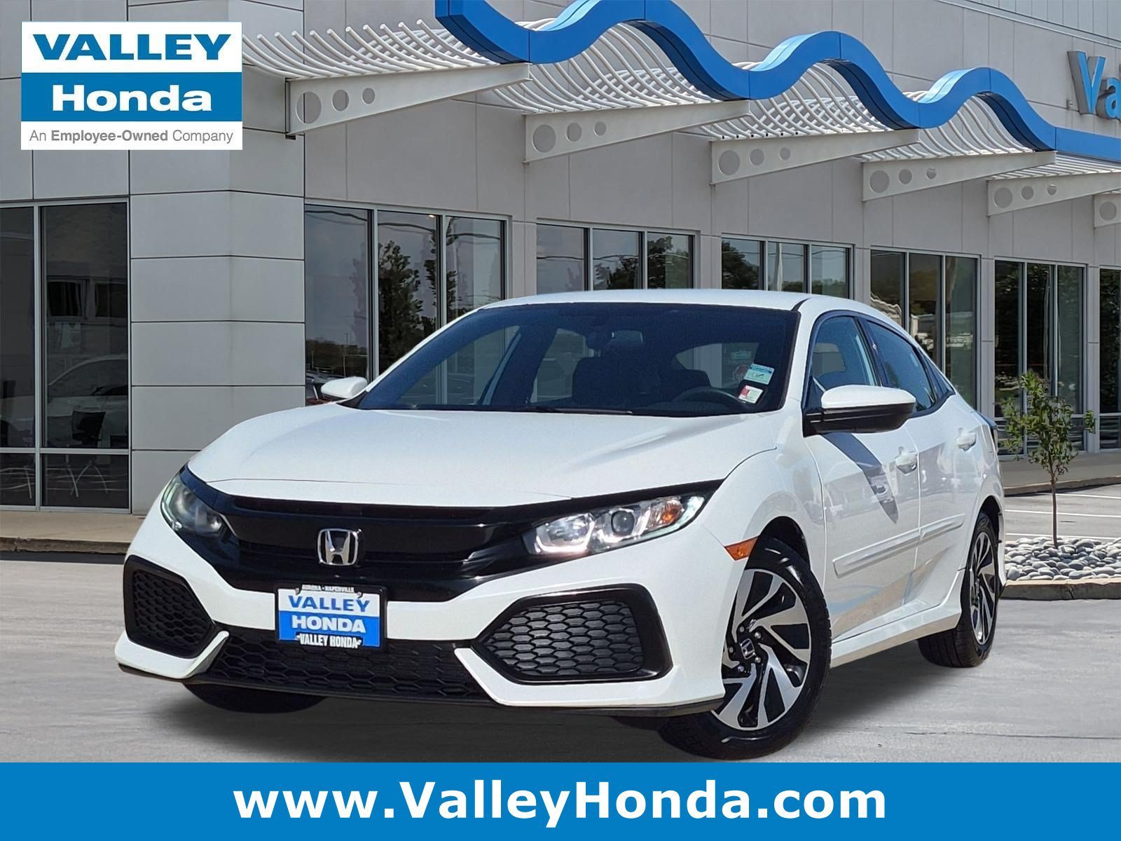 Used 2017 White Orchid Pearl Honda LX Hatchback image 1
