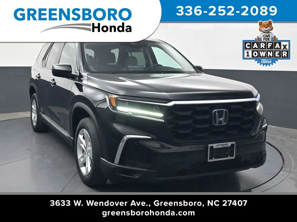 Used 2023 Crystal Black Pearl Honda LX image 1