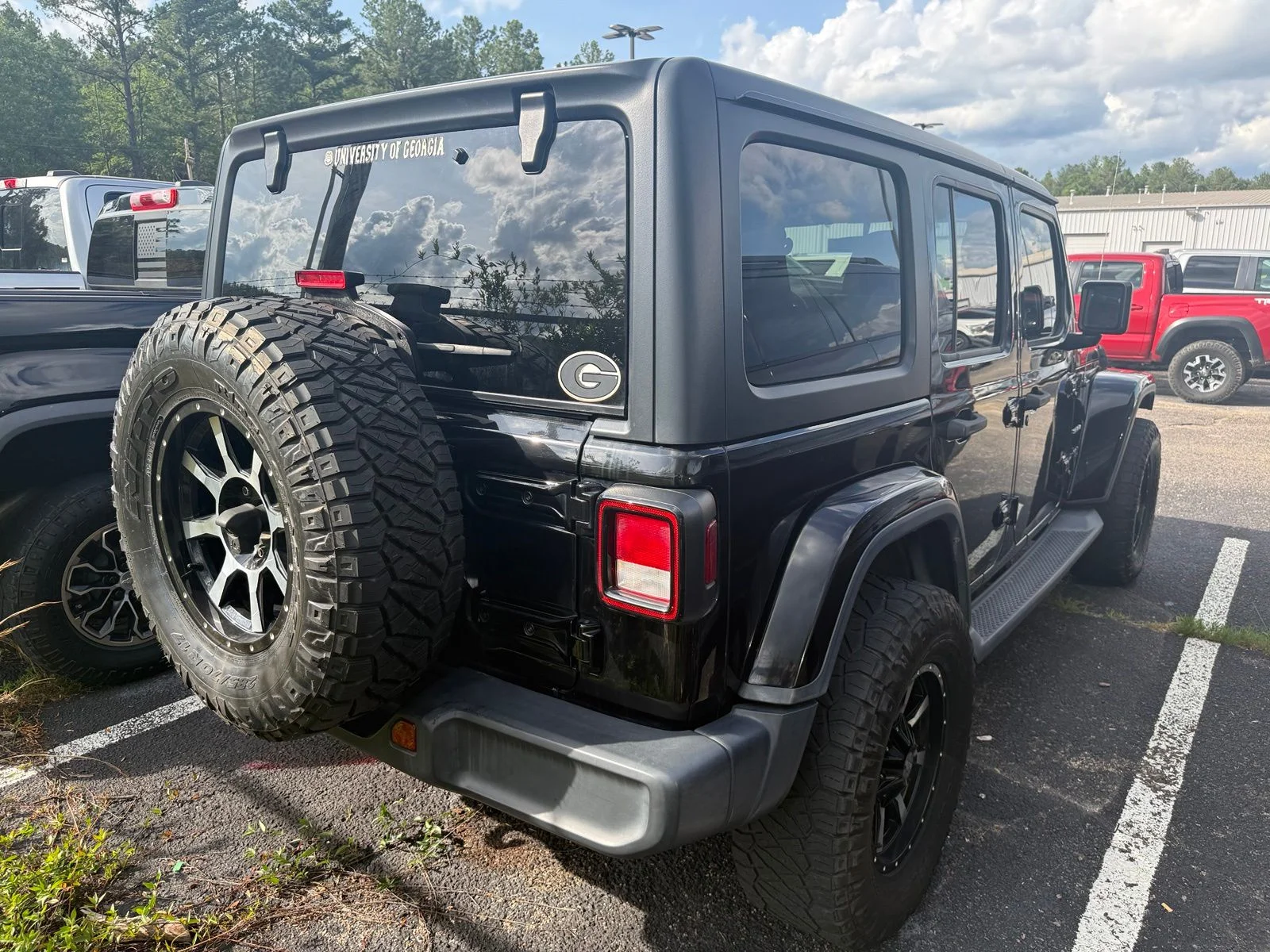 Used 2019 Black Jeep Unlimited Sahara image 4