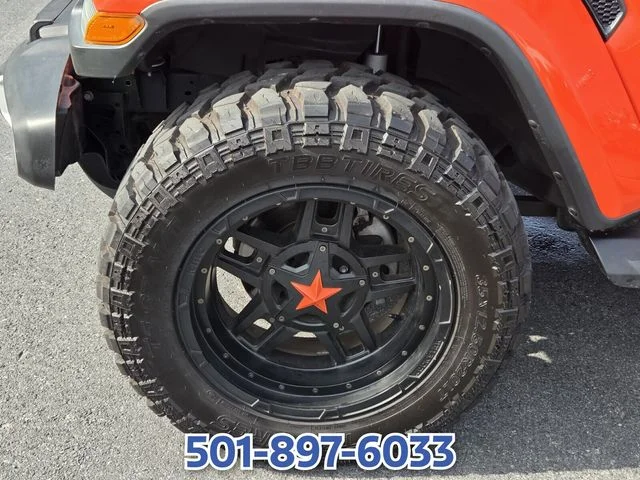Used 2020 Orange Jeep Unlimited Sahara image 16