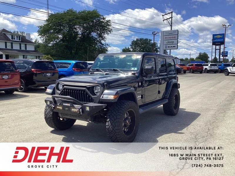 Used 2018 Black Jeep Unlimited Sahara image 3