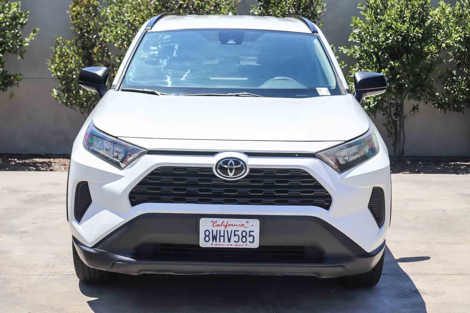 Used 2021 Super White Toyota LE image 2