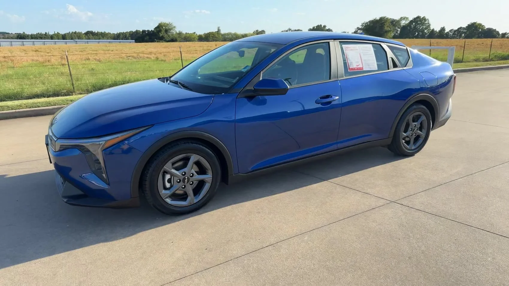 Used 2025 Deep Sea Blue Kia LXS image 4