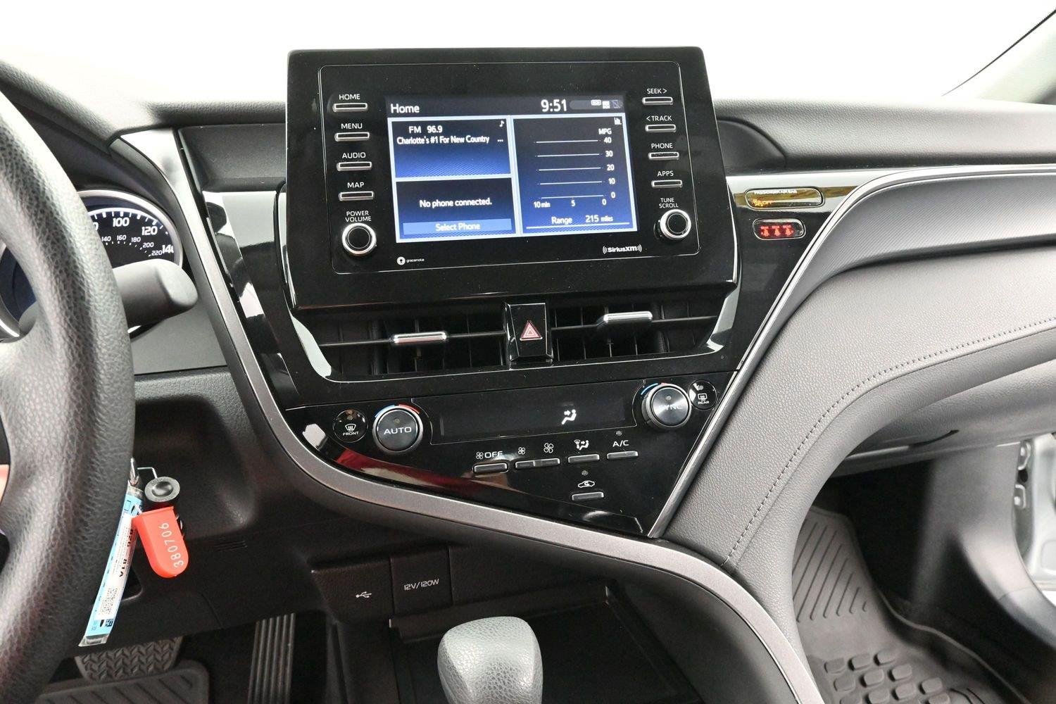 Used 2024 Celestial Silver Metallic Toyota LE image 20