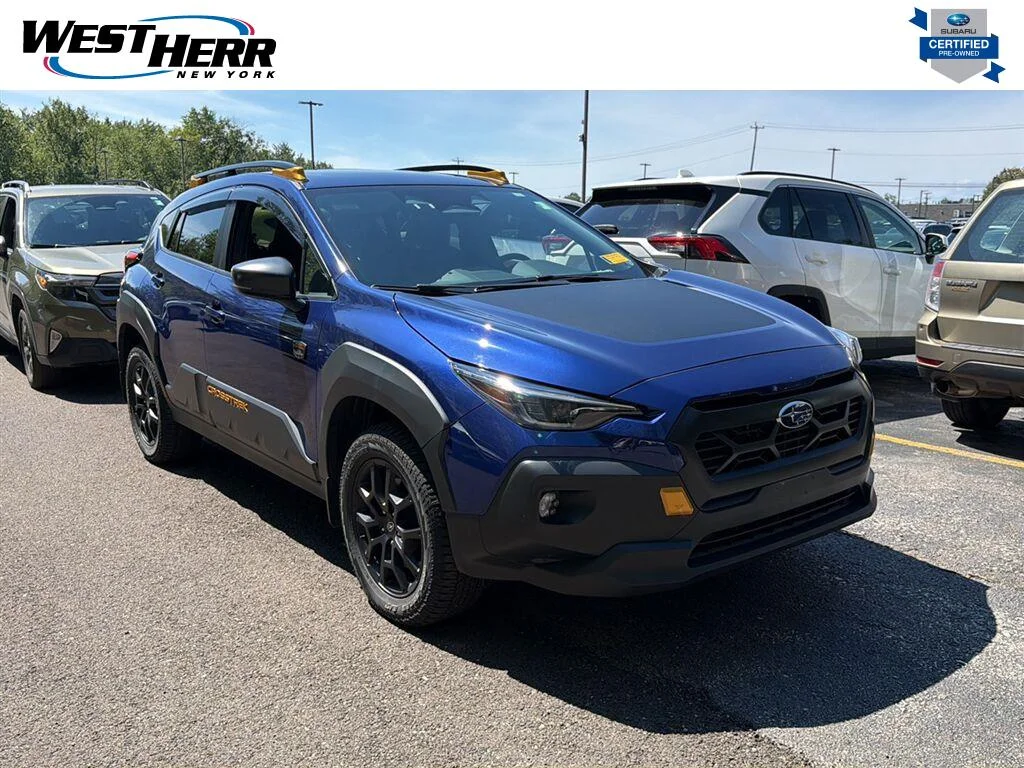 Used 2024 Sapphire Blue Pearl Subaru Wilderness image 1