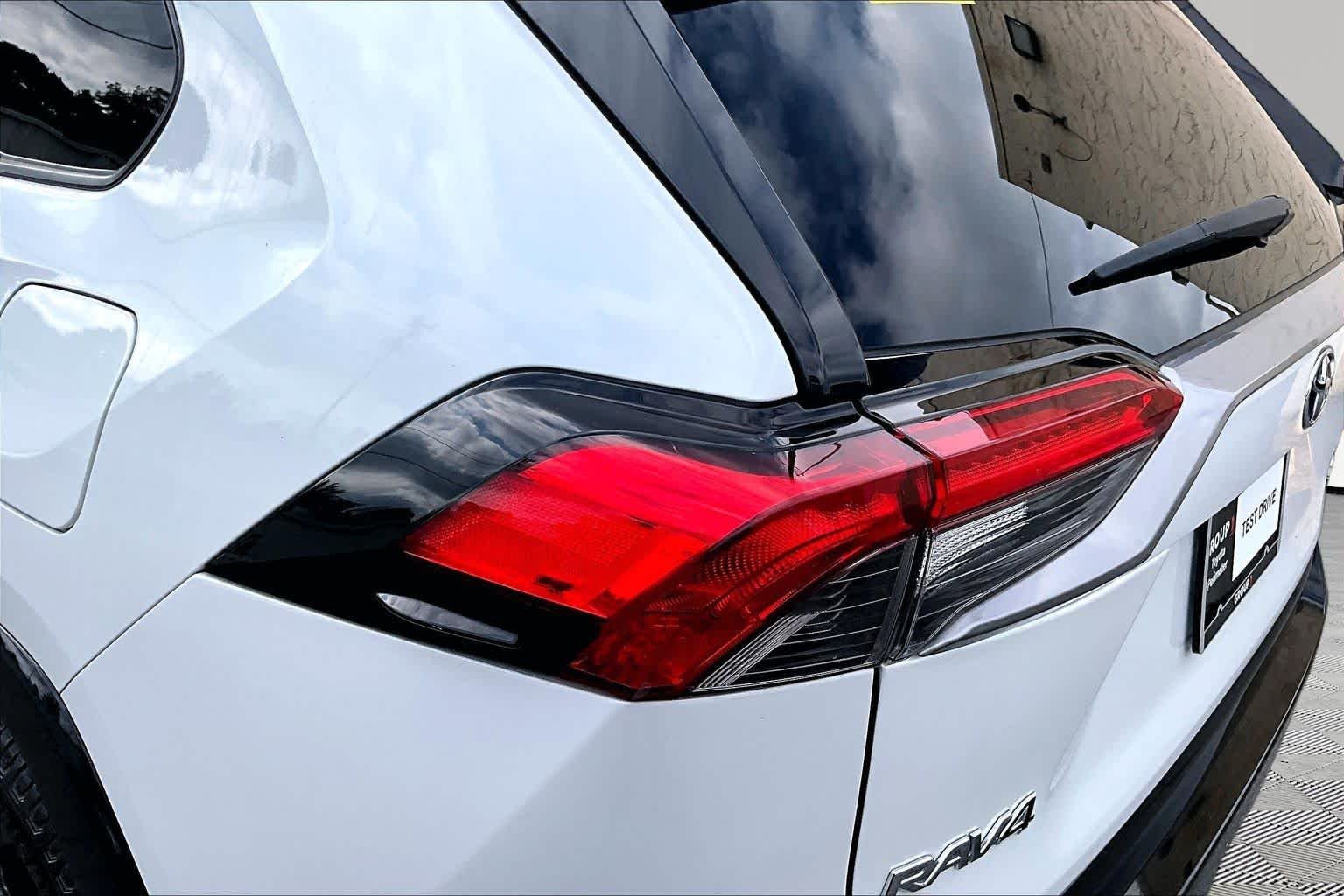 Used 2023 Wind Chill Pearl/Midnight Black Metallic Toyota Hybrid XSE image 29