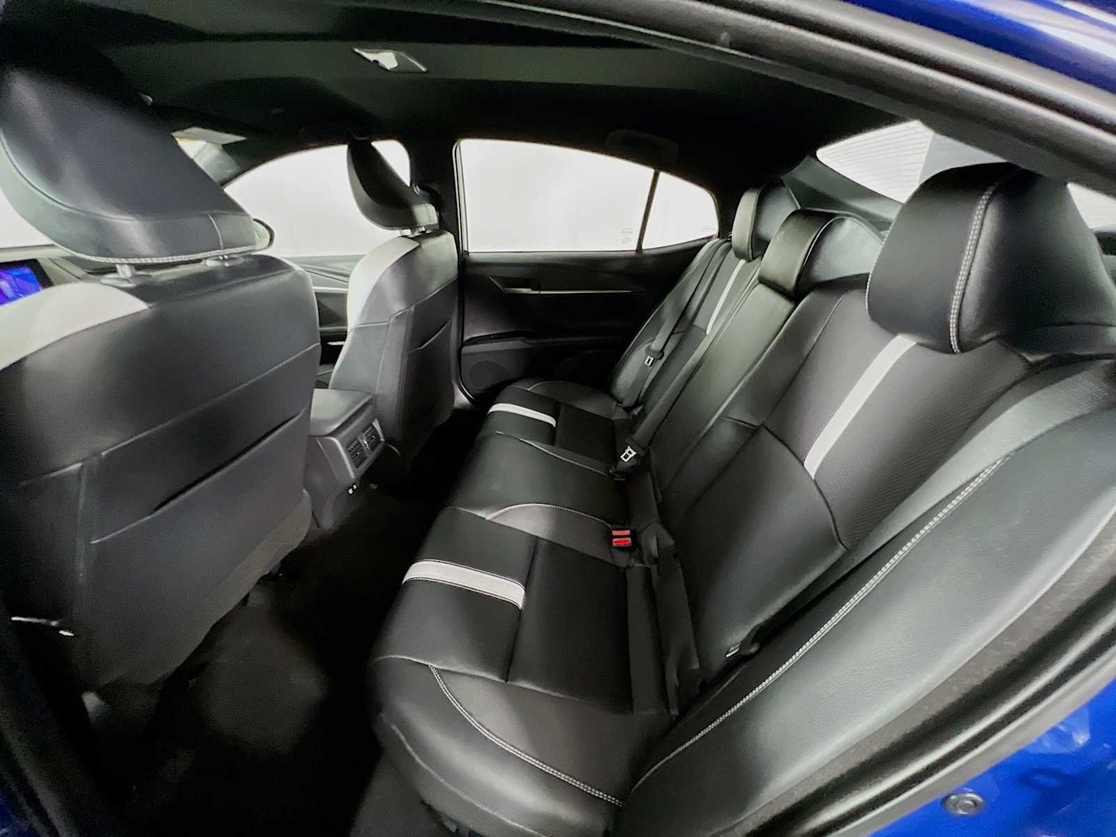 Used 2025 Reservoir Blue Toyota SE image 24