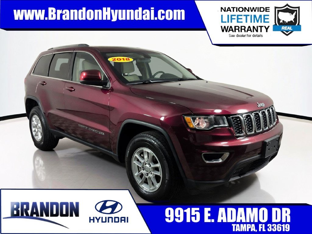 Used 2018 Red Jeep Laredo E image 1