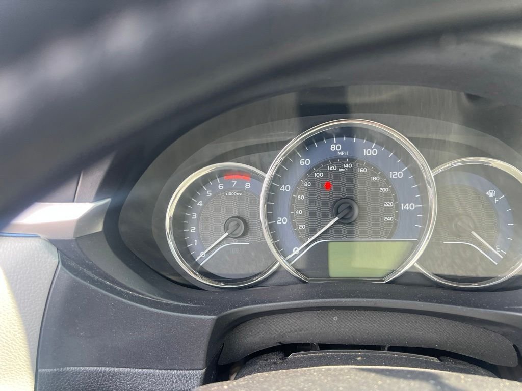 Used 2015 Classic Silver Metallic Toyota LE image 2