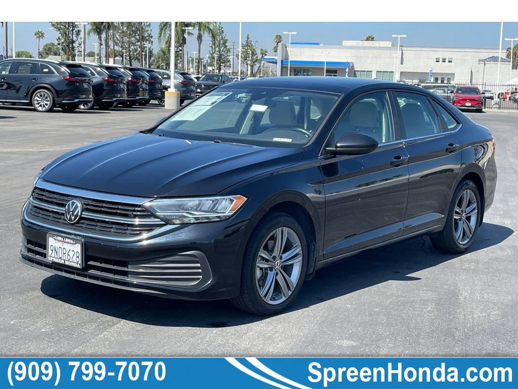 Used 2023 Deep Black Pearl Volkswagen SE image 1
