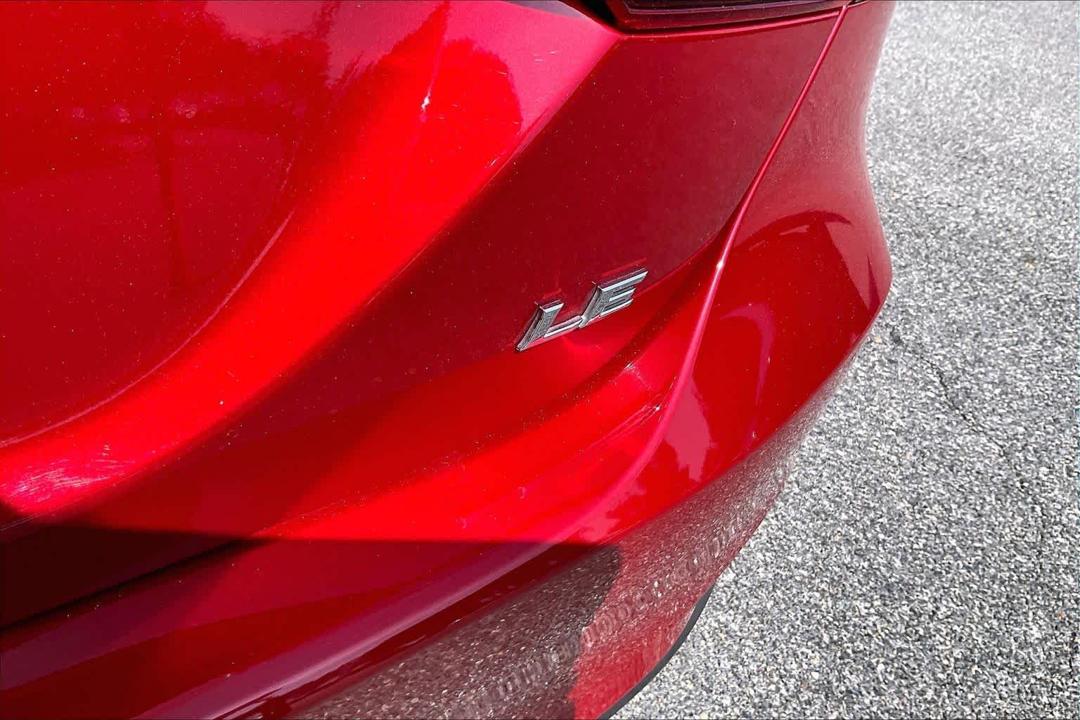 Used 2023 Supersonic Red Toyota LE image 10