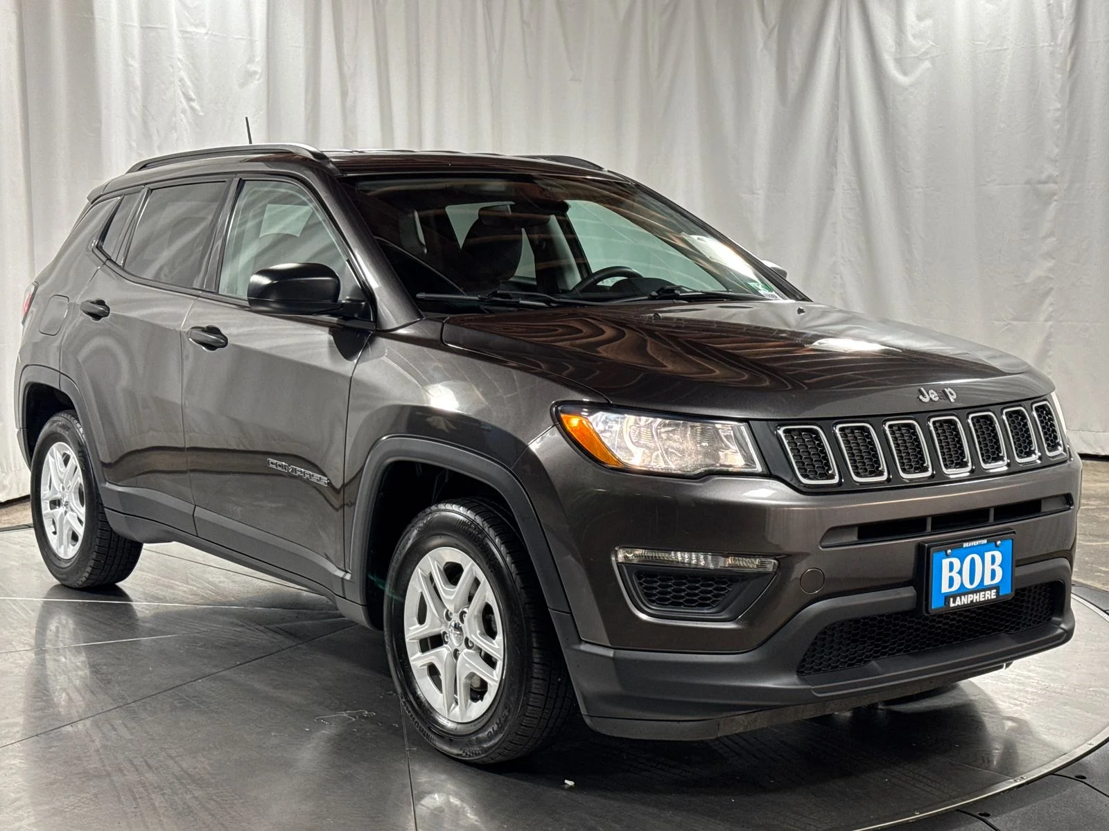 Used 2018 Granite Crystal Metallic Clearcoat Jeep Sport image 7
