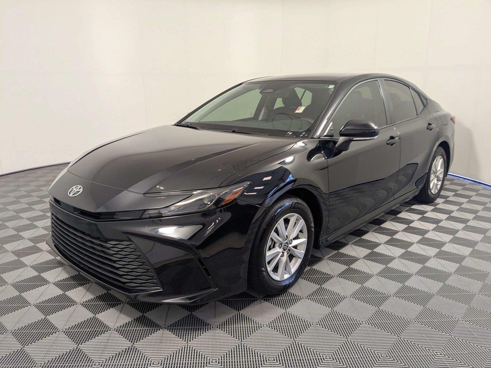 Used 2025 Midnight Black Metallic Toyota LE image 2