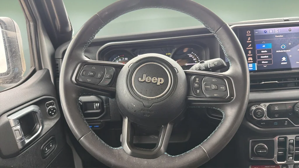 Used 2024 Silver Zynith Clearcoat Jeep Rubicon image 9