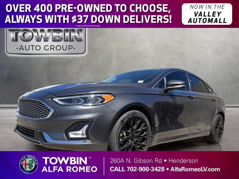 Used 2020 CHARCOAL FORD TITANIUM AWD image 1