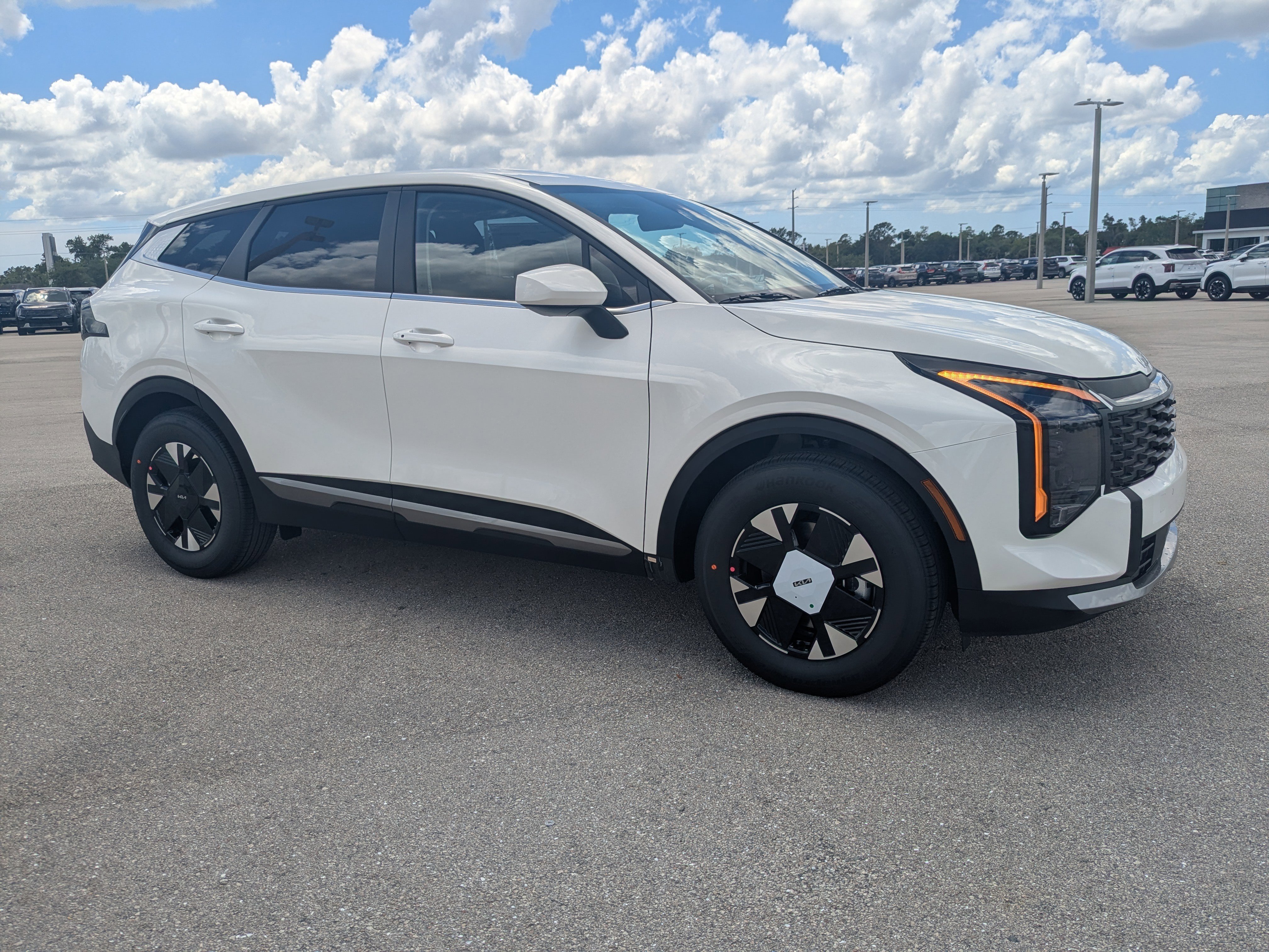 New 2026 Snow White Pearl Kia LX image 2