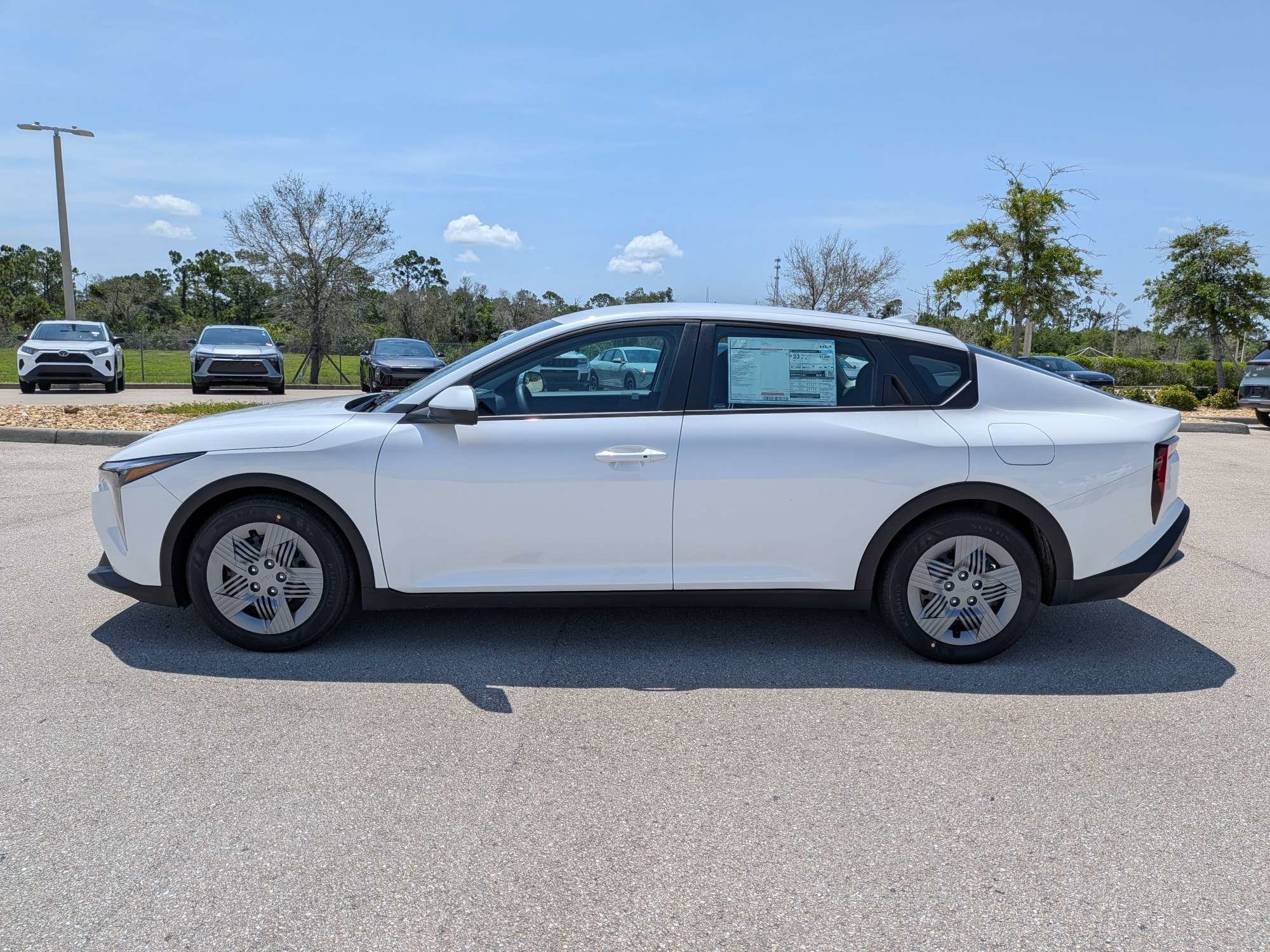 New 2026 Snow White Pearl Kia LX image 8