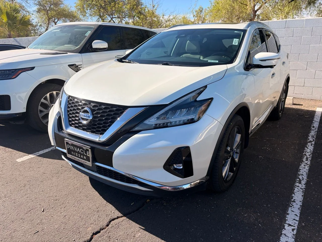 Used 2021 Pearl White Nissan Platinum image 2