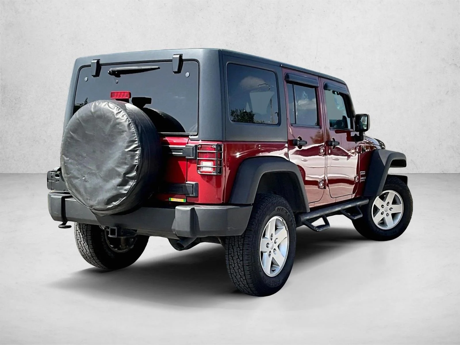 Used 2013 Deep Cherry Red Crystal Pearl Jeep Sport image 2