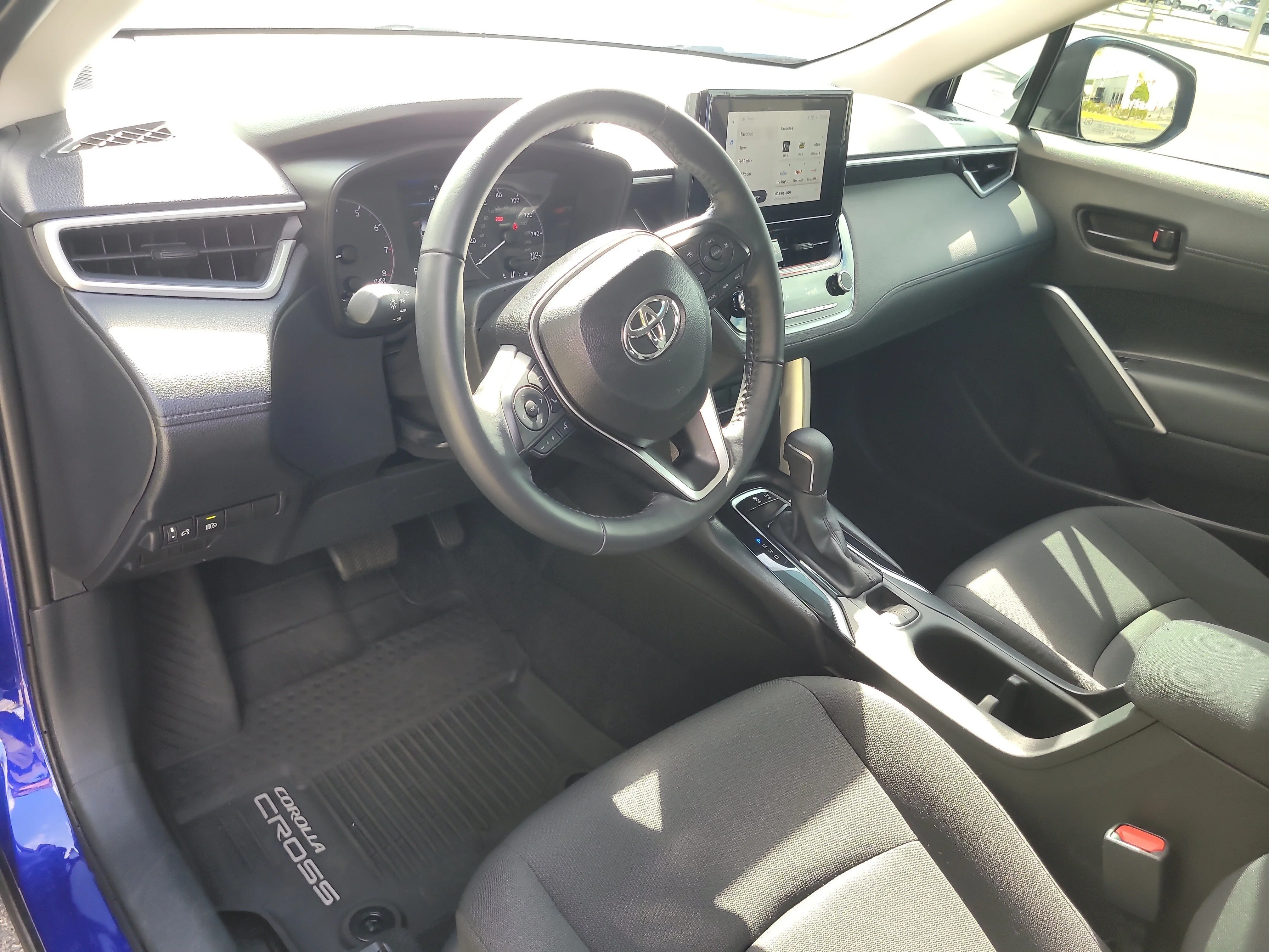 Used 2025 Blue Crush Metallic Toyota LE image 17