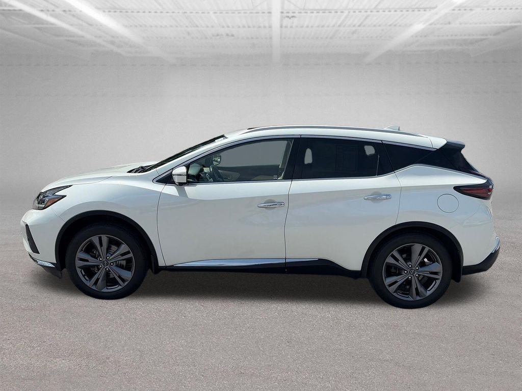 Used 2024 Pearl White Nissan Platinum image 3