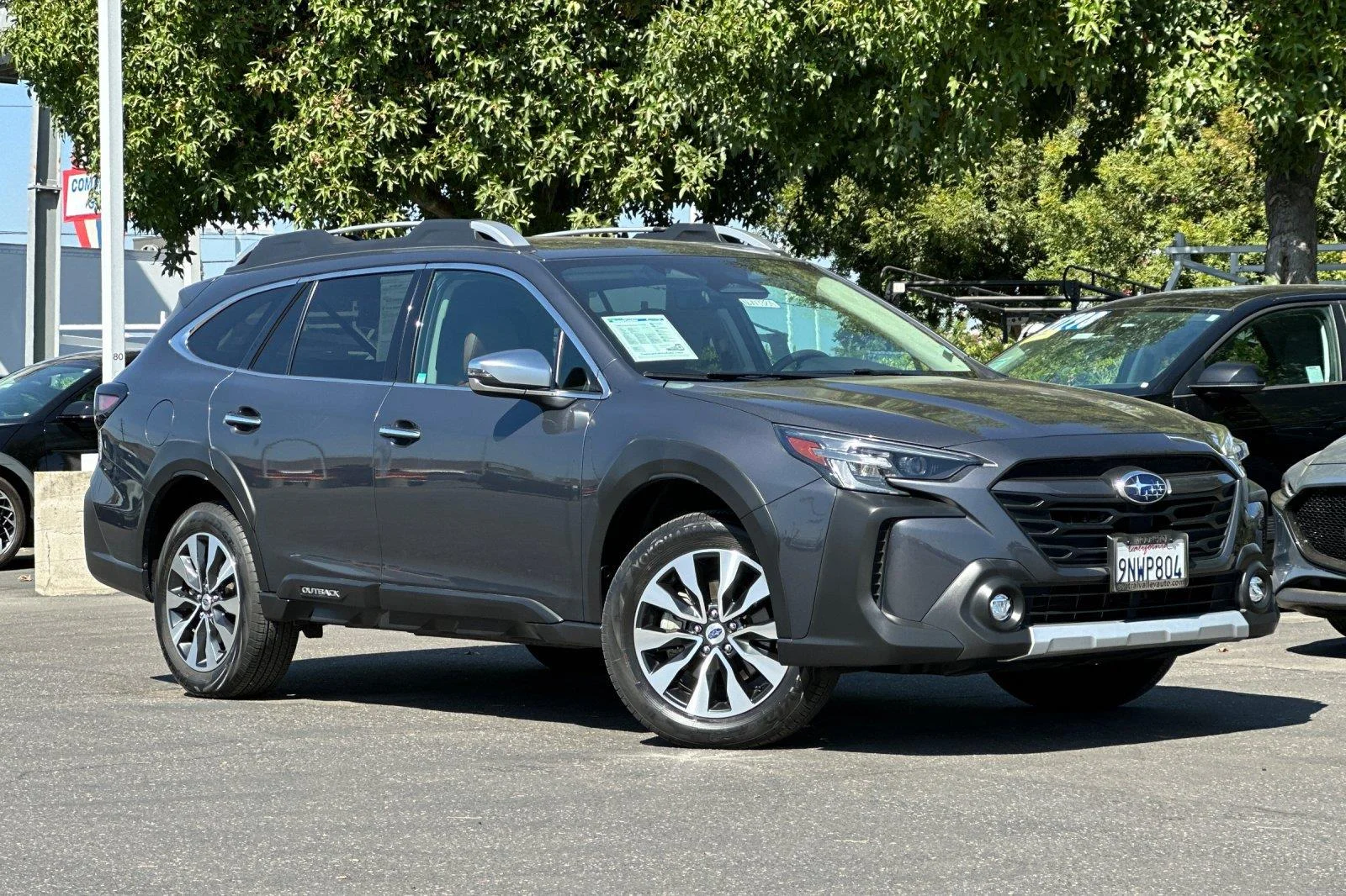 Used 2024 Magnetite Gray Metallic Subaru Touring image 1