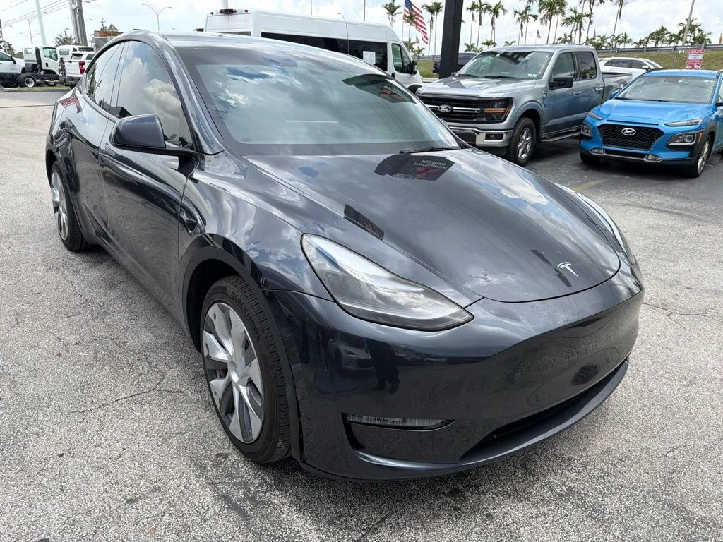 Used 2024 Tesla Model Y Long Range with VIN 7SAYGAEE6RF079796 for sale in Miami Lakes, FL