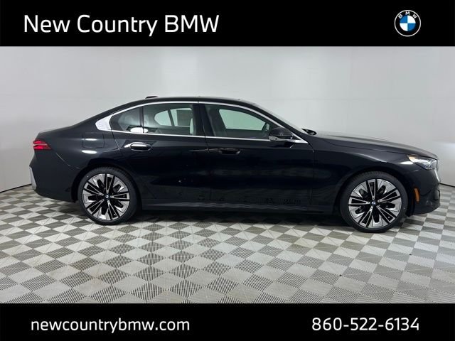 New 2027 Black Sapphire Metallic BMW 550e xDrive image 8