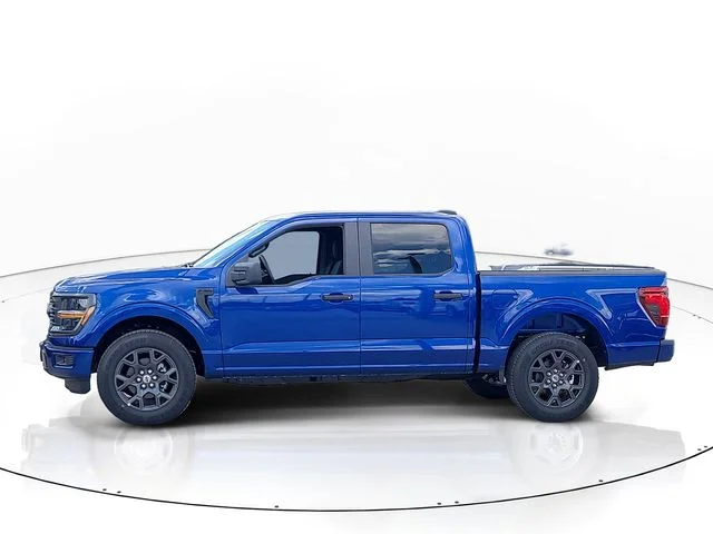 New 2026 Blue Metallic Ford STX image 4