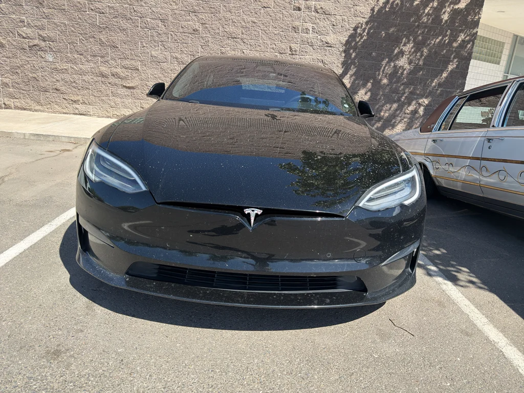 Used 2022 Solid Black Tesla Plaid image 2