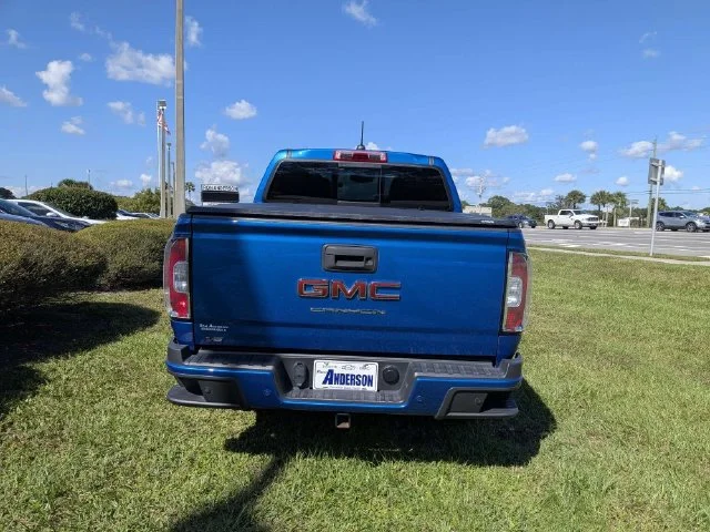 Used 2021 DYNAMIC BLUE METALLIC GMC 2WD Elevation image 4