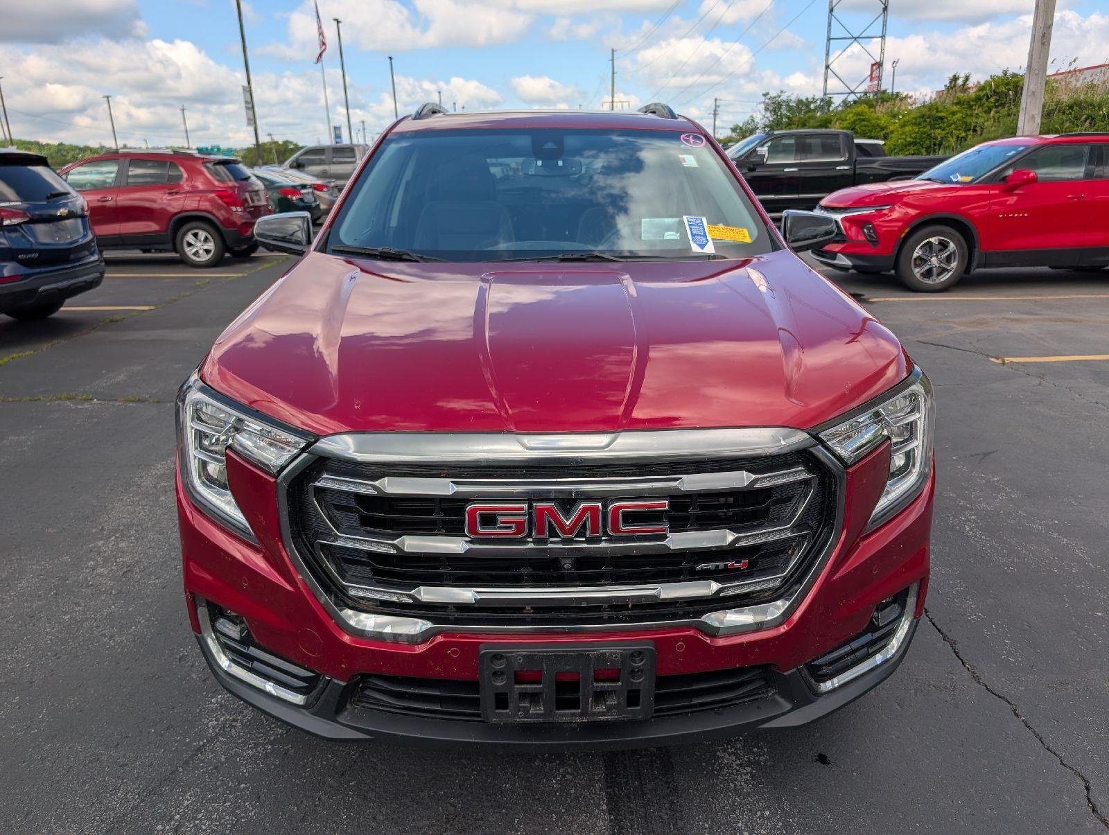 Used 2024 Volcanic Red Tintcoat GMC AT4 image 2