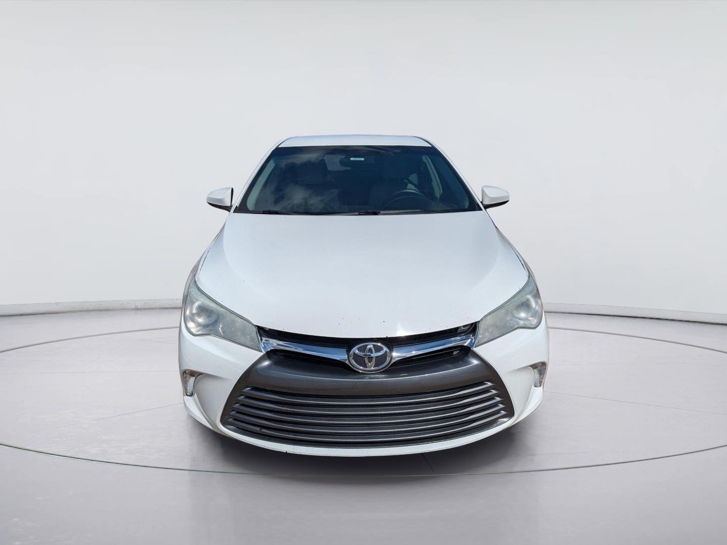 Used 2016 Toyota Camry LE with VIN 4T4BF1FK1GR571619 for sale in Madison, MS