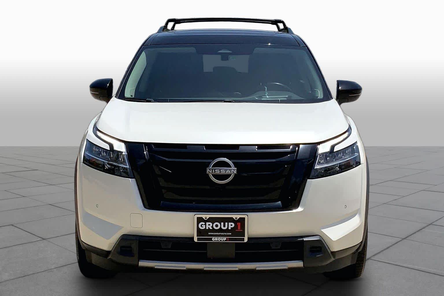 Used 2024 Pearl White Tricoat/Super Black Nissan Platinum image 4