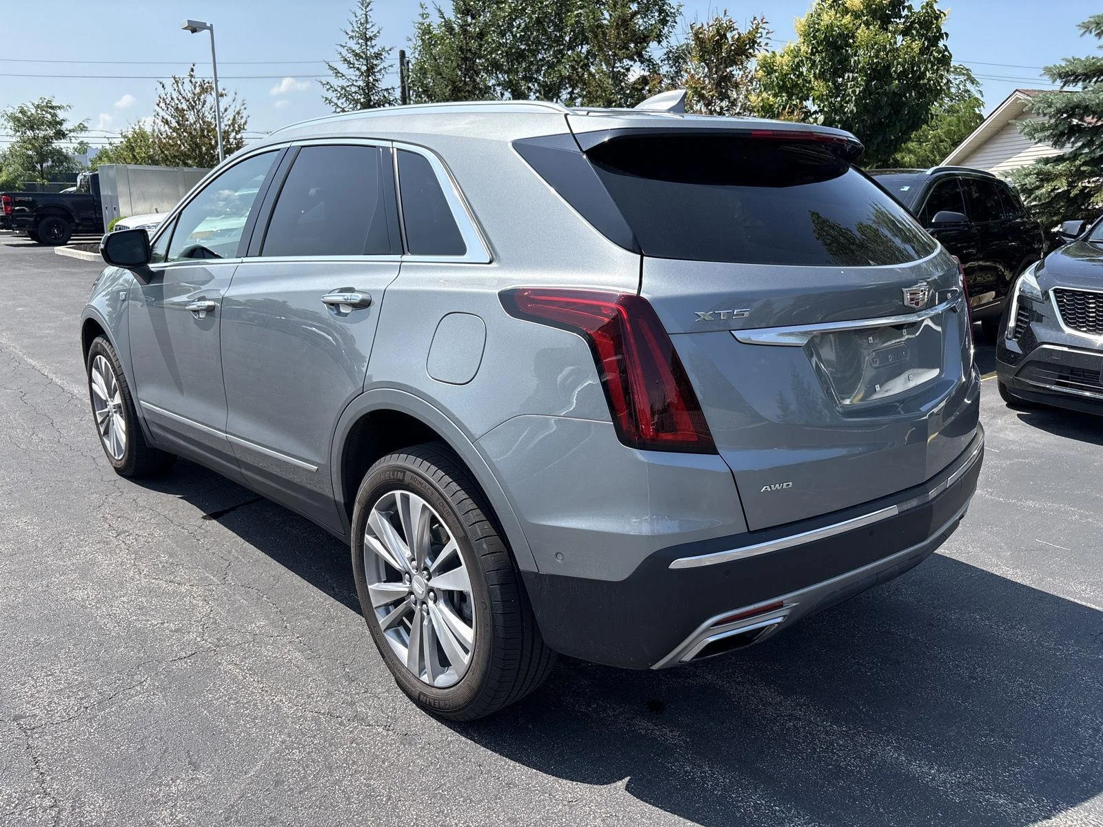 Used 2024 Argent Silver Metallic Cadillac AWD Premium Luxury image 17
