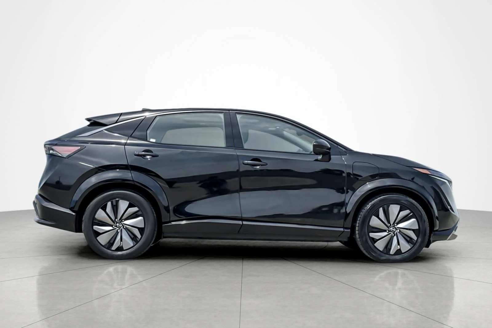 Used 2024 Black Diamond Pearl Nissan EVOLVE+ image 6