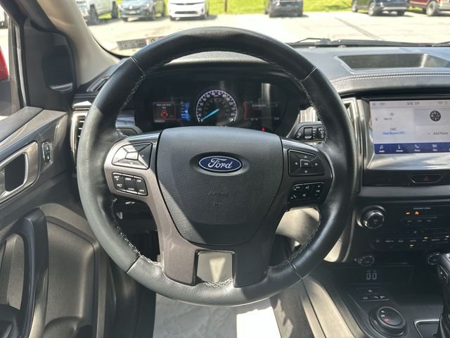 Used 2020 Rapid Red Metallic Tinted Clearcoat Ford Lariat image 13