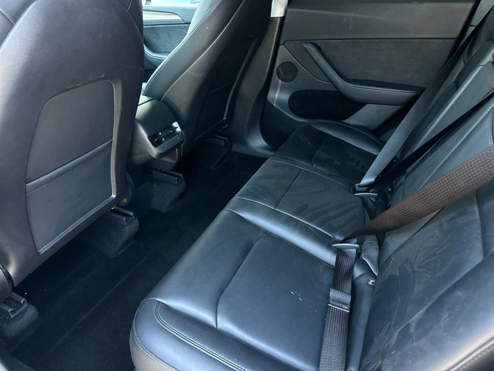 Used 2022 Solid Black Tesla Performance image 11
