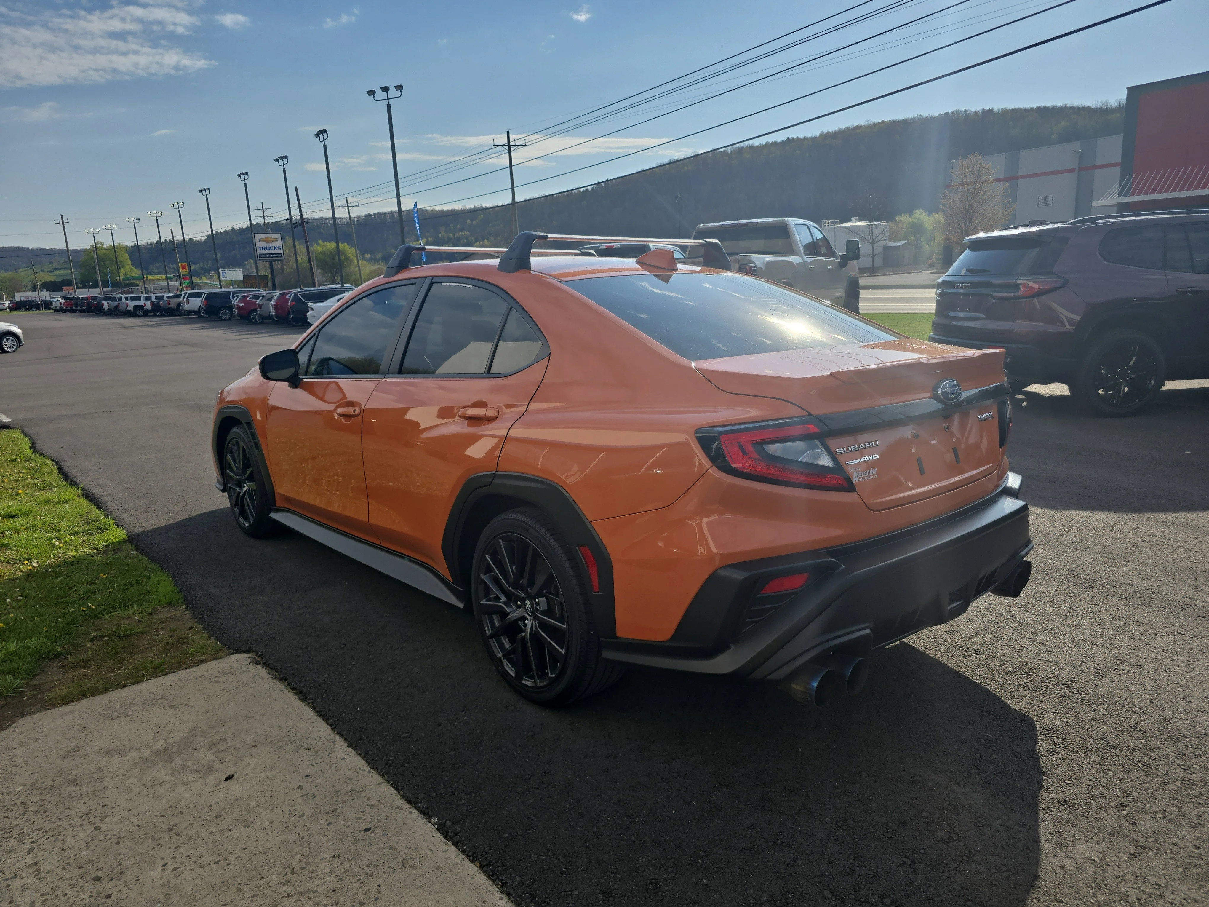Used 2023 Solar Orange Pearl Subaru Premium image 6
