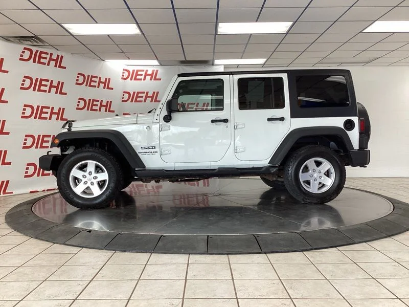 Used 2014 White Jeep Unlimited Sport image 4