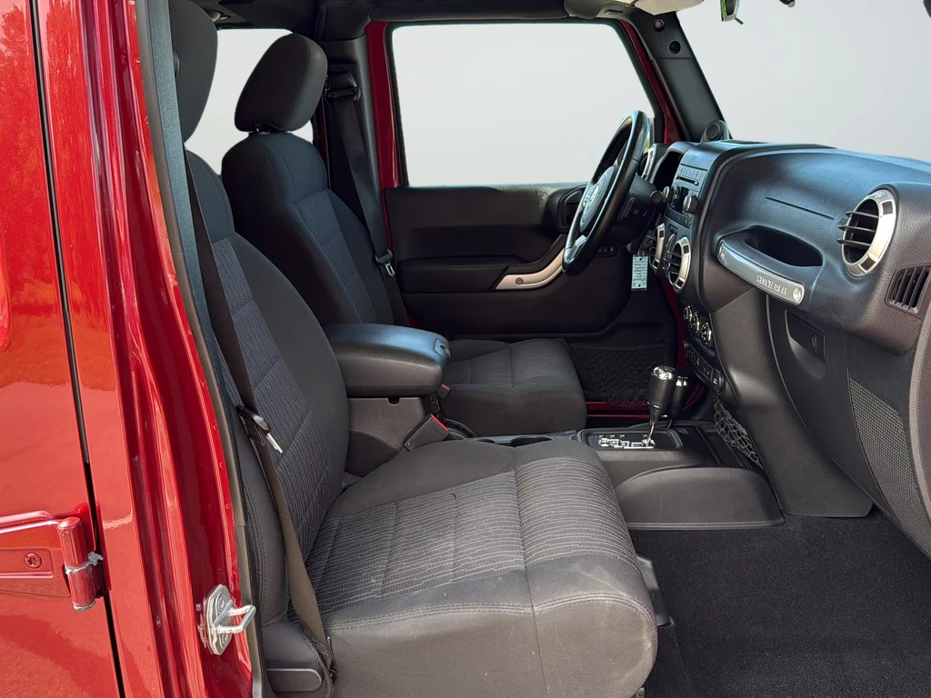 Used 2012 Red Jeep Unlimited Sahara image 20
